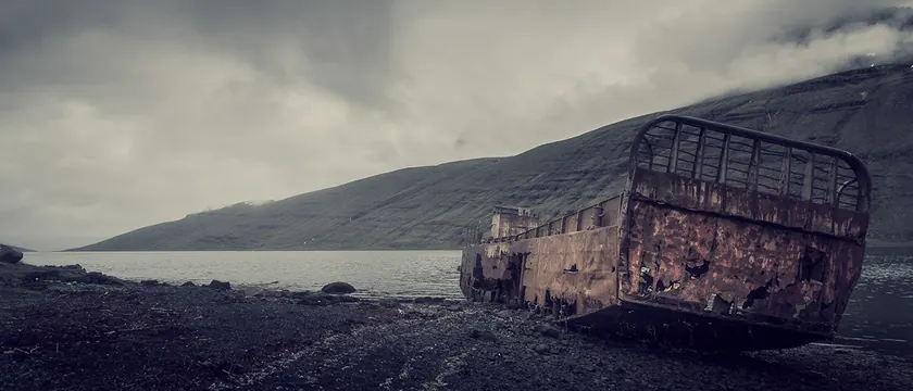 Abandoned Train Car in Snowy Landscape, photographic, minimal, muted