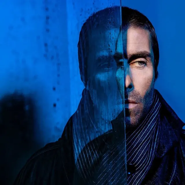 Split-Face Portrait with Blue Overlay, photographic, dark-mode, dark