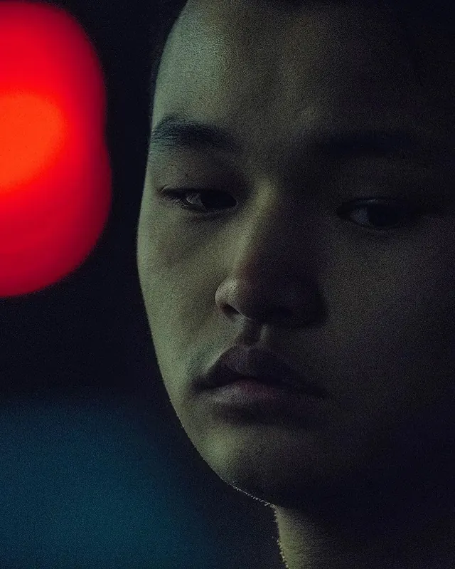 Close-up Portrait with Red Bokeh, photographic, dark-mode, dark