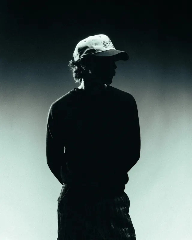 Silhouette of a Person in a Cap, monochrome, photographic, monochrome