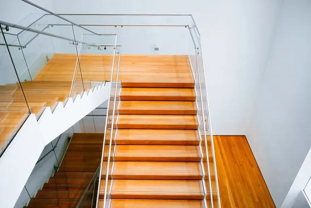 Modern Wooden Staircase with Glass Railing, minimal, photographic, warm