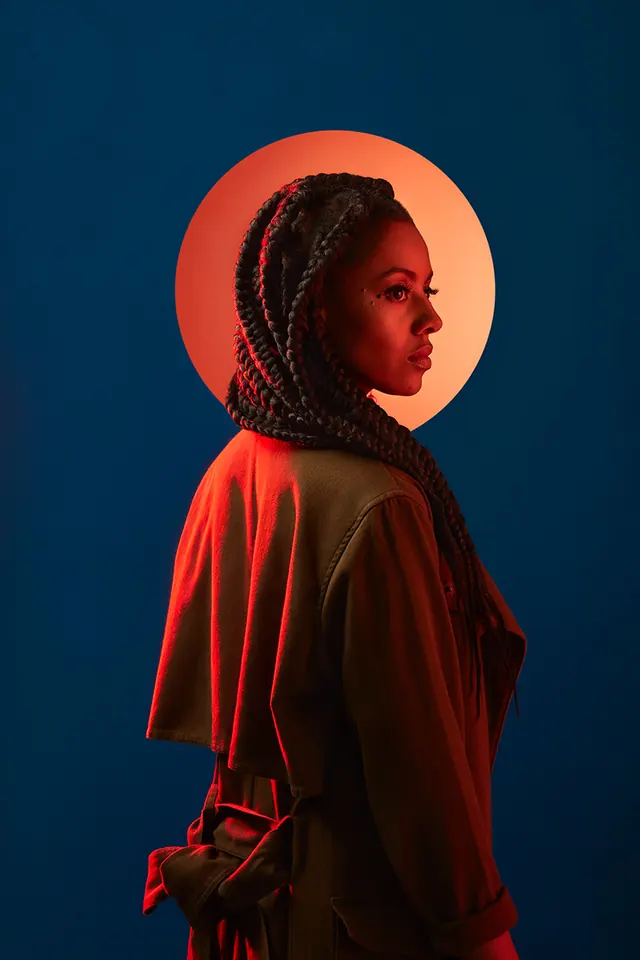 Portrait of a Woman in a Red Robe, photographic, minimal, vibrant