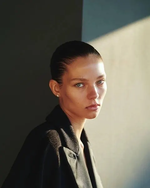 Portrait of a Woman in a Leather Jacket, minimal, luxury, dark