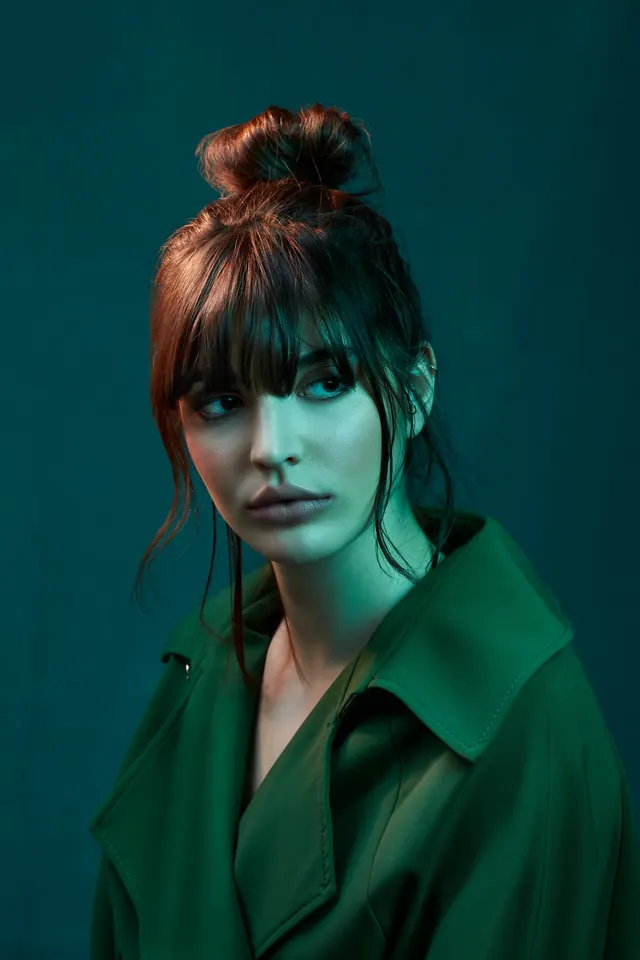 Portrait of a Woman in Green Shirt, photographic, luxury, cool