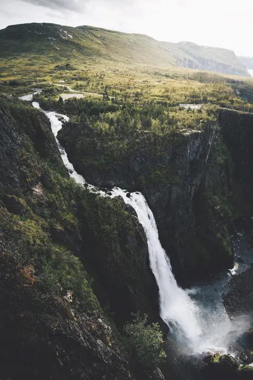 Waterfall in a Mountainous Landscape, photographic, organic, earthy