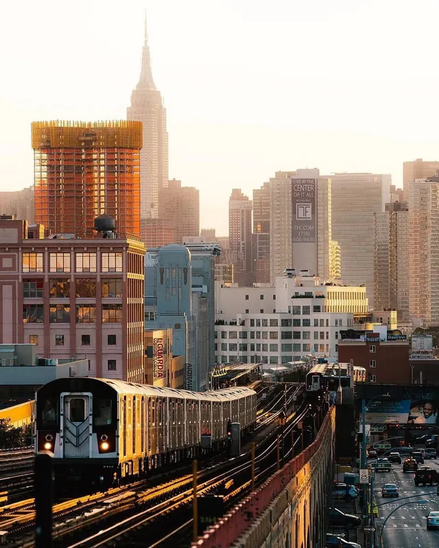 Urban Skyline and Train Infrastructure, photographic, geometric, warm