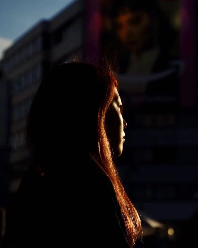 Profile Silhouette with Urban Backdrop, photographic, dark-mode, dark