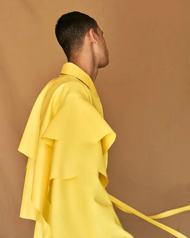 Man in Yellow Garment, minimal, photographic, warm