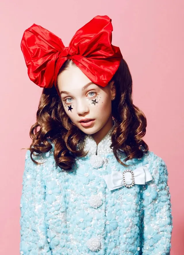 Woman in Red Bow and Blue Coat, photographic, luxury, vibrant