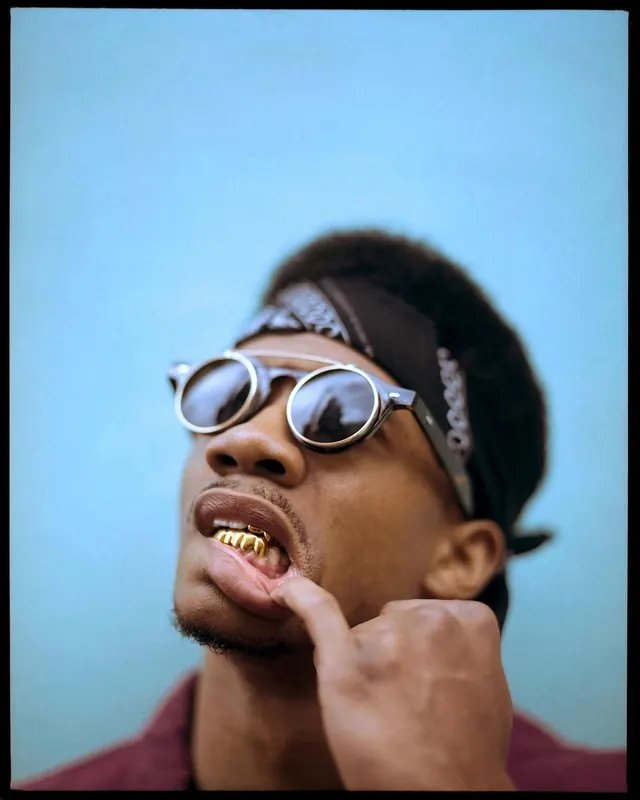 Close-up Portrait of a Man with Sunglasses, photographic, retro, vibrant
