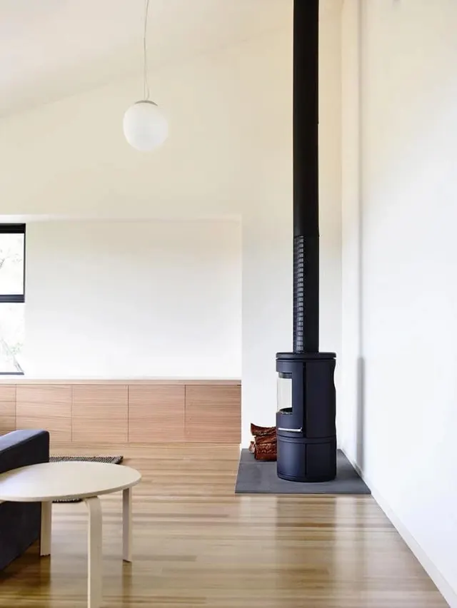 Minimalist Interior with Wood Paneling and Black Fireplace, minimal, luxury, light