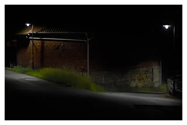 Nighttime Industrial Exterior, photographic, dark-mode, dark