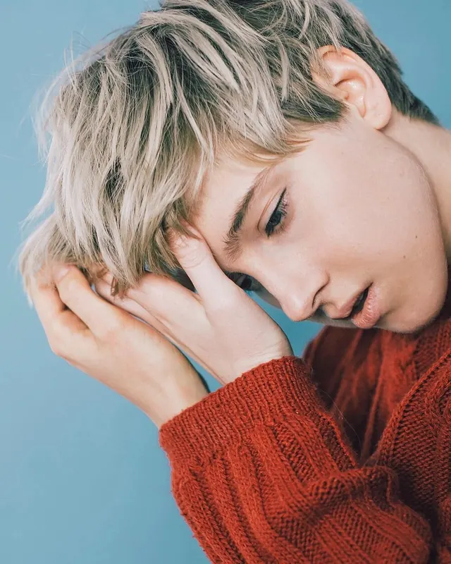 Portrait of a Young Man with Blonde Hair, photographic, organic, vibrant
