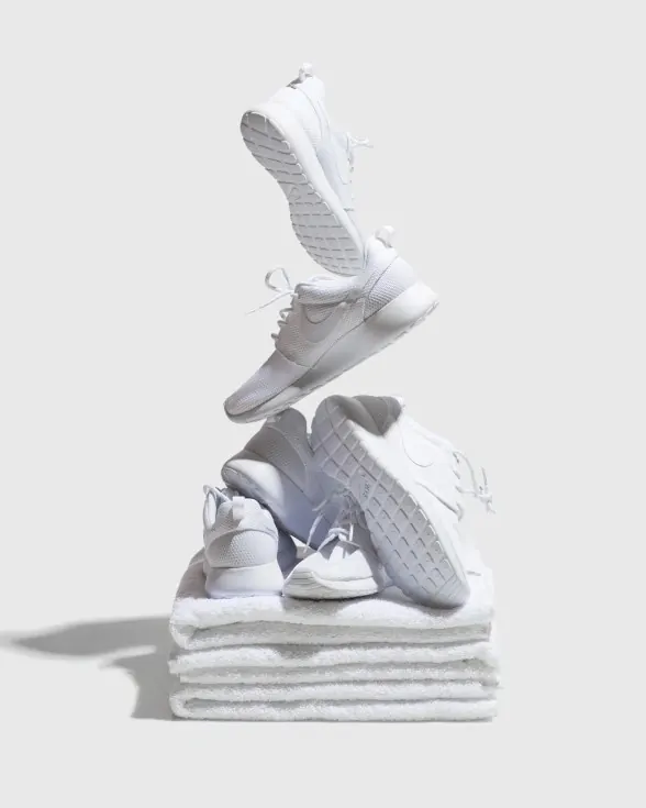 3D Render of White Sneakers on a Pedestal, minimal, 3d-render, monochrome