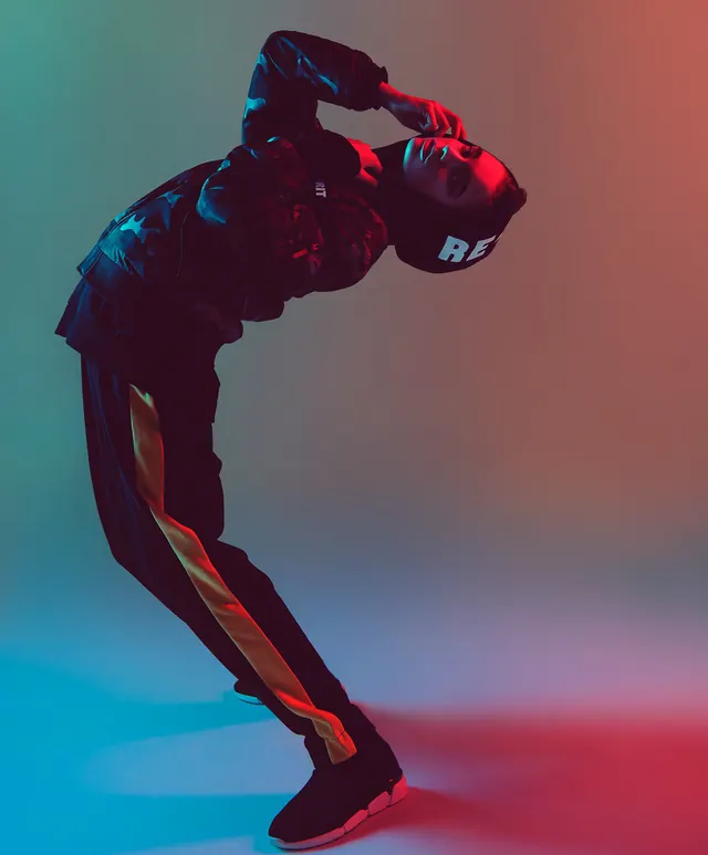 Cyberpunk Athlete Portrait, photographic, gradient-heavy, vibrant