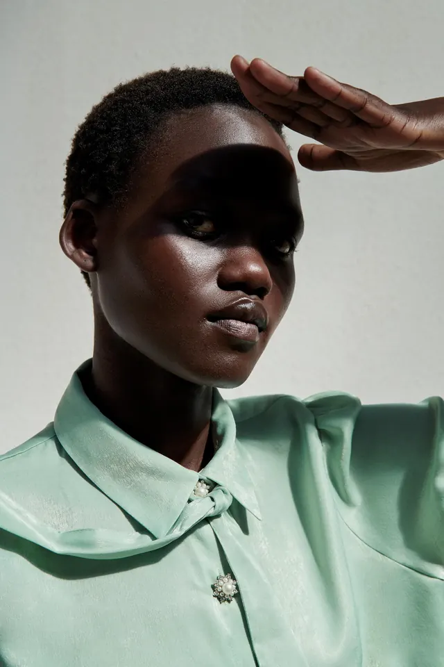 Portrait of a Woman in Mint Green Shirt, minimal, luxury, muted