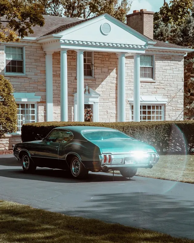 Luxury Sedan in Front of Neoclassical Building, photographic, luxury, light