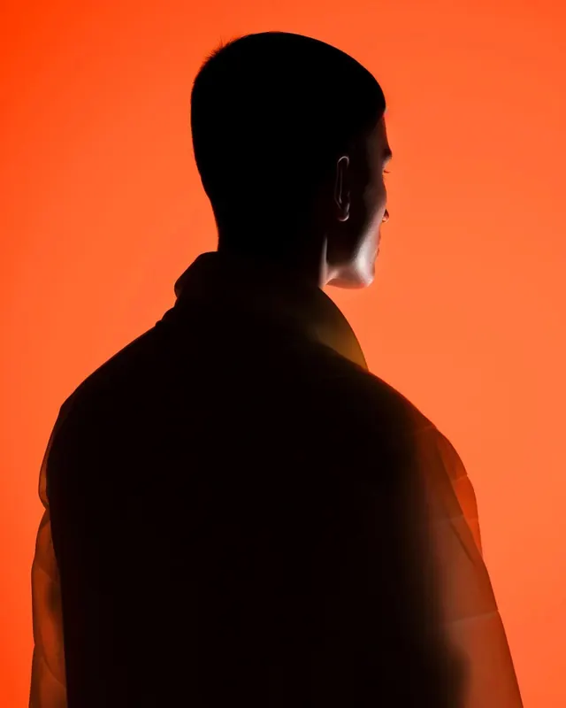 Silhouette Profile in Orange, minimal, photographic, vibrant