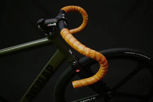 Road Bike with Orange Handlebar Tape, photographic, technical, vibrant