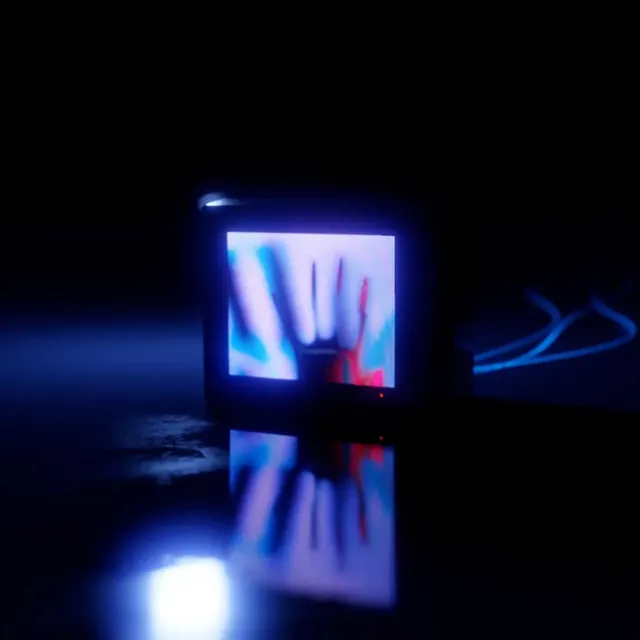 Glowing Hand on Screen Mockup, dark-mode, abstract, dark
