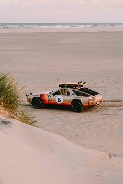 Racing Car on Beach, photographic, minimal, muted