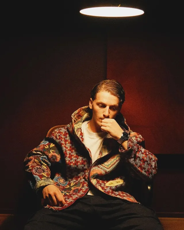 Man in Patterned Jacket, photographic, maximalist, warm