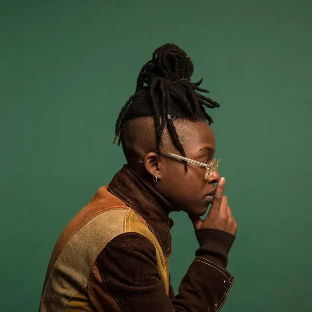 Portrait of a Man with Dreadlocks, photographic, vibrant