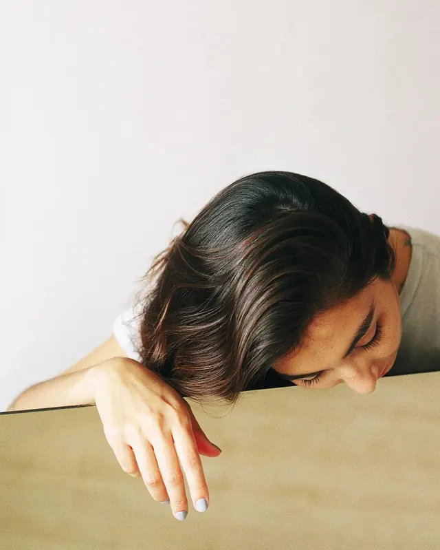 Woman Resting Head on Table, minimal, photographic, muted