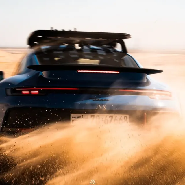 Off-Road Porsche 911 in Sand, photographic, luxury, dark