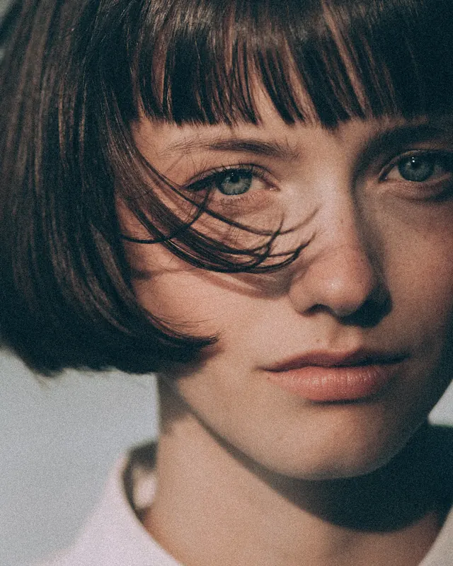 Portrait of a Woman with Short Hair, photographic, organic, muted