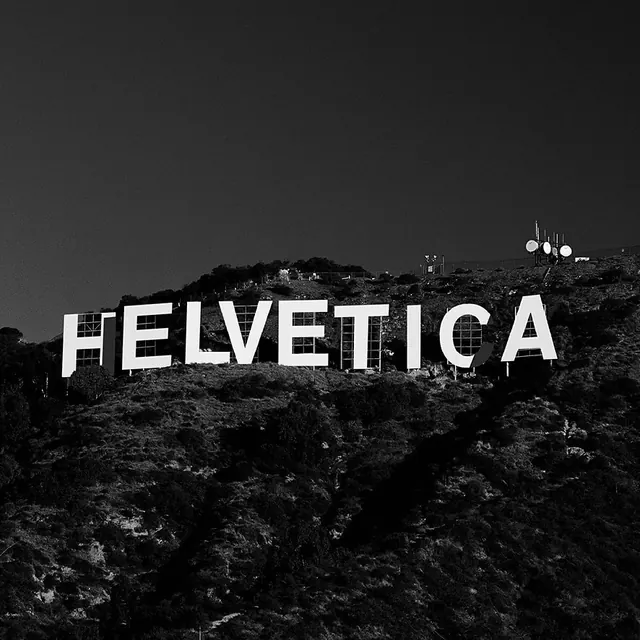 Helvetica Wordmark on Mountain Landscape, minimal, swiss, monochrome
