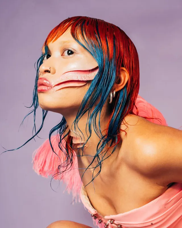 Portrait of a Woman with Face Paint, photographic, maximalist, vibrant