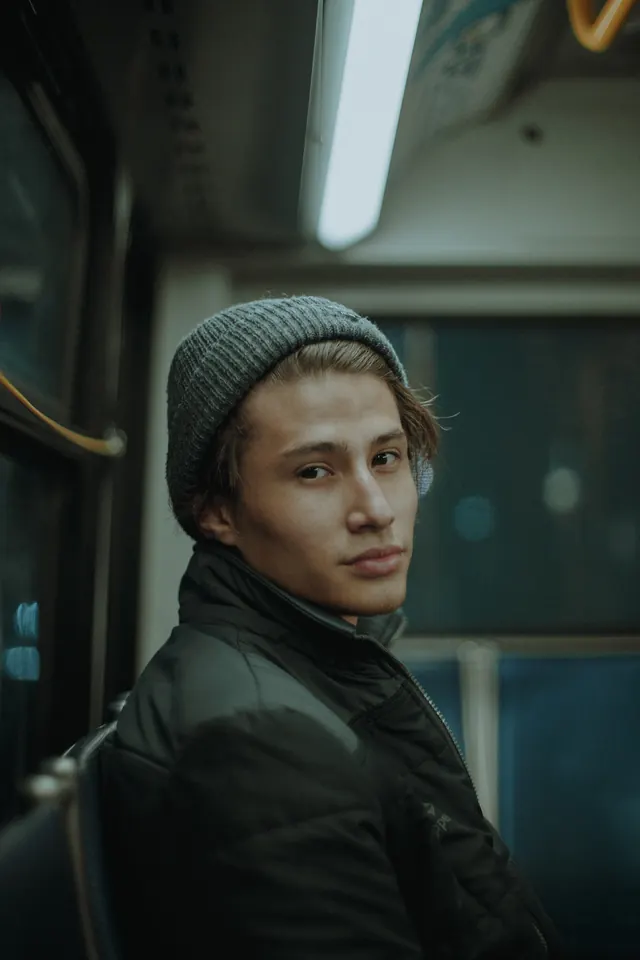 Portrait of a Man in a Beanie, photographic, dark
