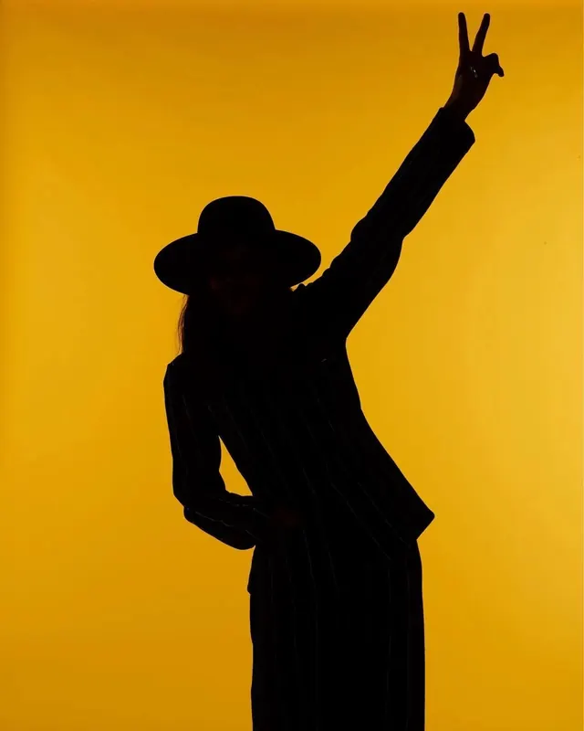 Silhouette of a Person in Yellow, minimal, photographic, vibrant