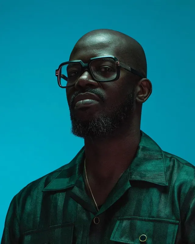 Portrait of a Man with Glasses, photographic, vibrant