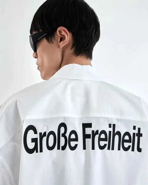 White Jacket with Typography Mockup, minimal, photographic, high-contrast