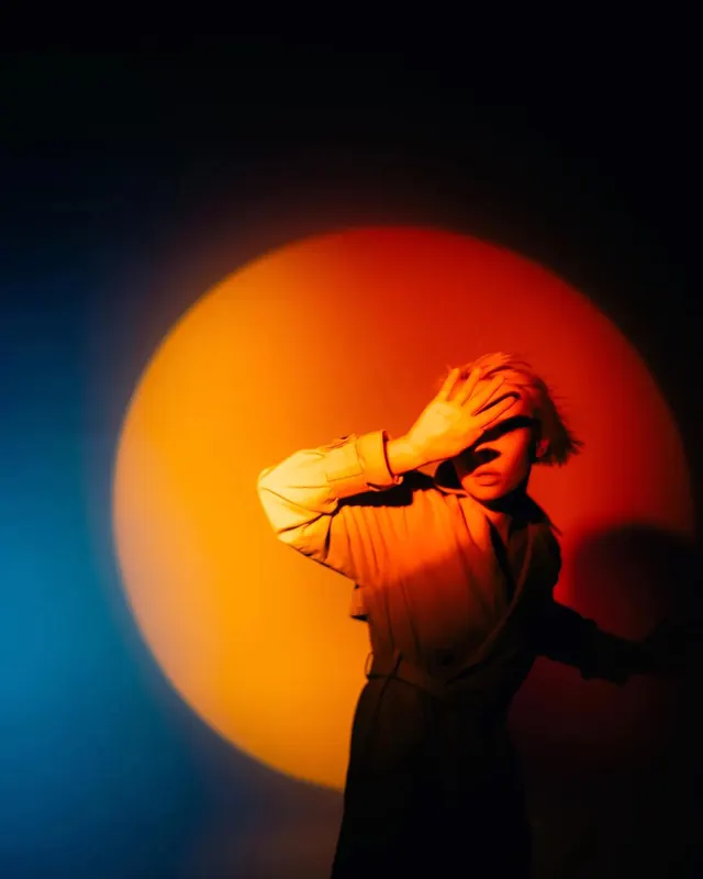 Woman in Circular Light, photographic, abstract, vibrant
