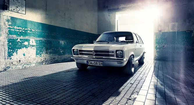 Vintage Car in Industrial Garage, retro, photographic, high-contrast