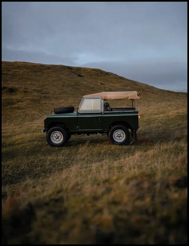 Vintage Off-Road Vehicle in Field, photographic, retro, muted