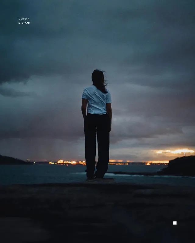 Woman Standing on Beach at Dusk, minimal, photographic, dark