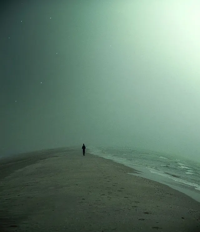 Lone Figure on Misty Beach, minimal, photographic, muted