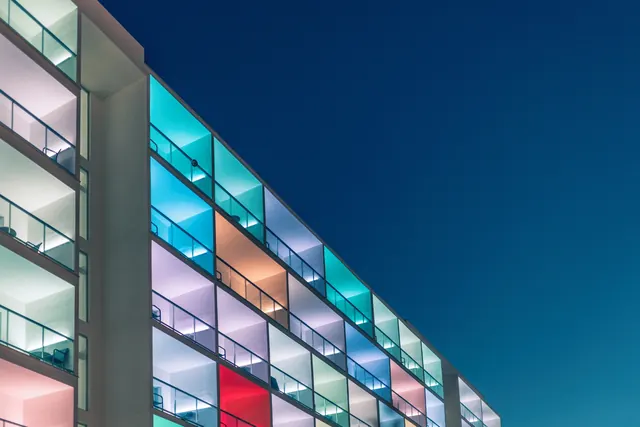 Modern Architectural Facade with Colorful Windows, minimal, geometric, vibrant