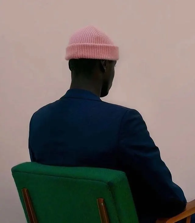 Portrait of a Person in a Pink Beanie, minimal, photographic, vibrant