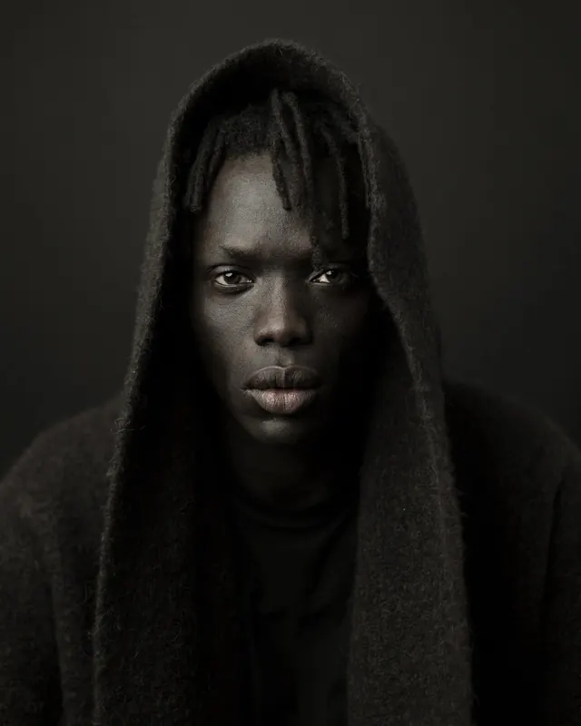 Portrait of a Man in a Hooded Garment, monochrome, photographic, monochrome