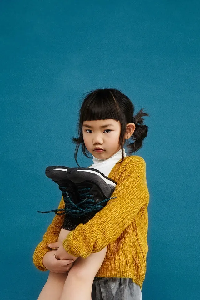 Girl with Headphones and Laptop, photographic, minimal, vibrant