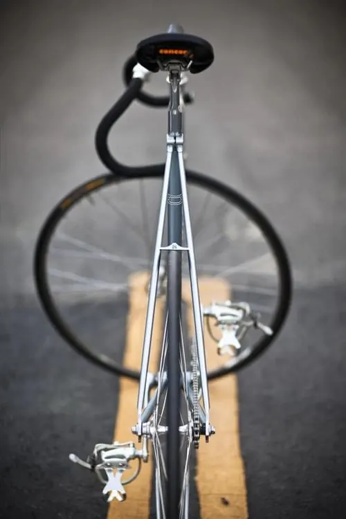 Bicycle on Road, photographic, minimal, high-contrast