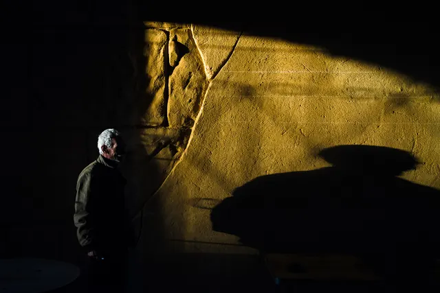 Man in Shadow with Golden Texture, dark-mode, photographic, dark