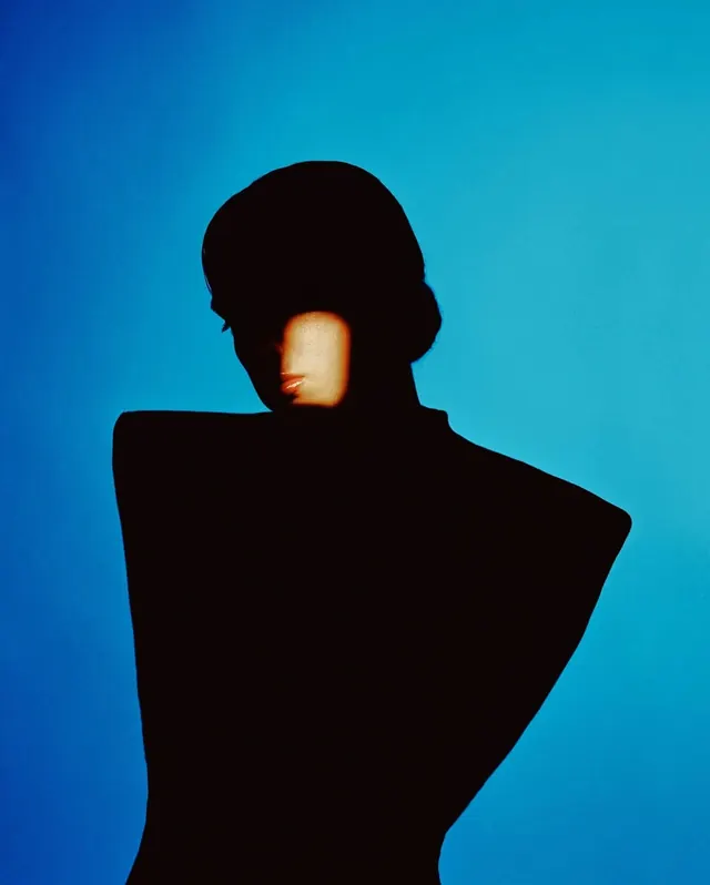 Silhouette Portrait with Glowing Face, minimal, abstract, vibrant