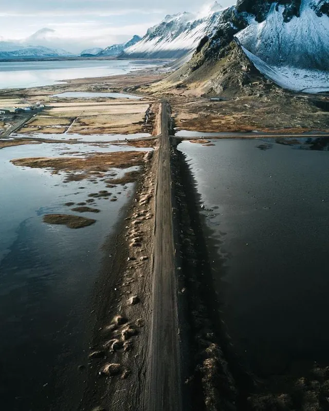 Aerial View of a Coastal Road, photographic, organic, cool