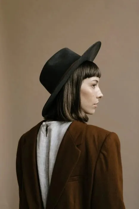 Portrait of a Woman in a Wide-Brimmed Hat, minimal, luxury, muted